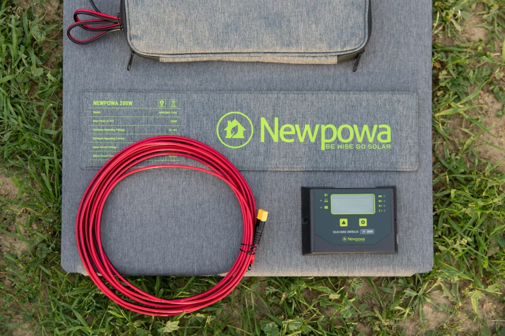 a newpowa electronic device is laying on the ground
